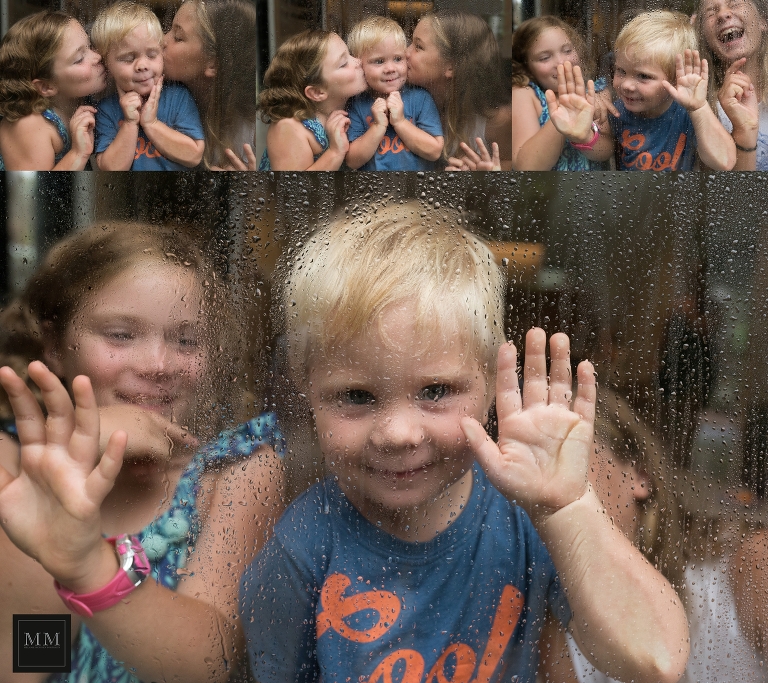 children with raindrops on a window