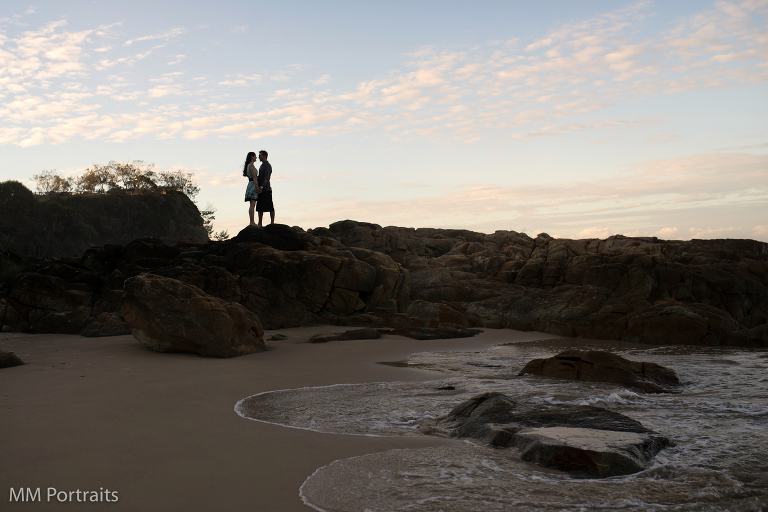 silhouette of couple on the beach