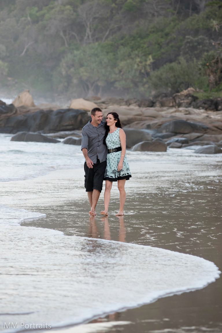 couple walking along the beach