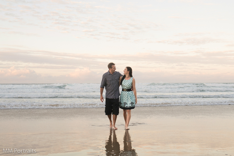 couple on the beach at sunset
