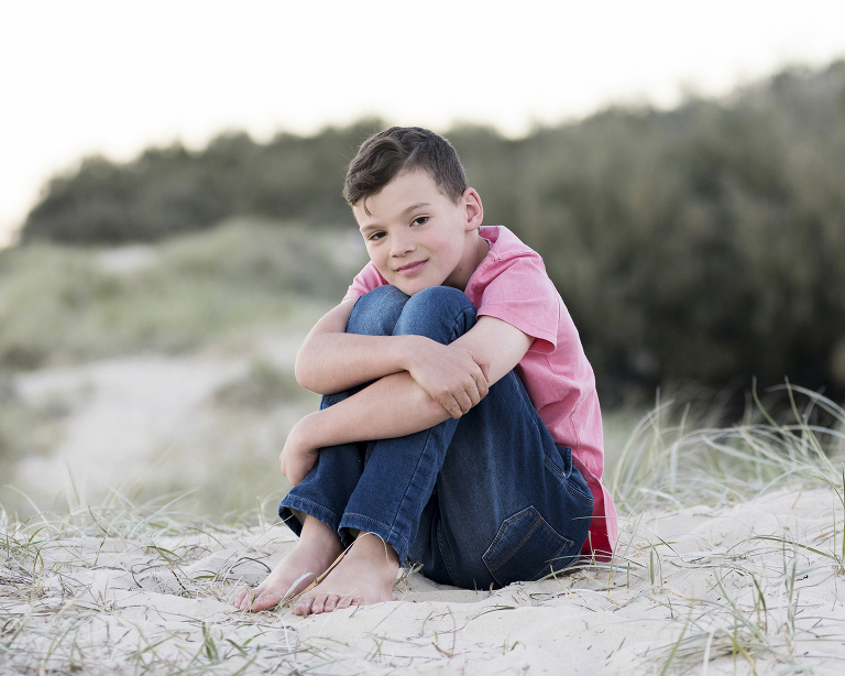 photo of boy on Noosa beach