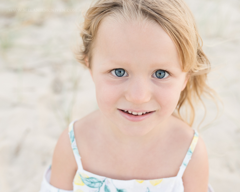 close up of a little girl looking at the camera